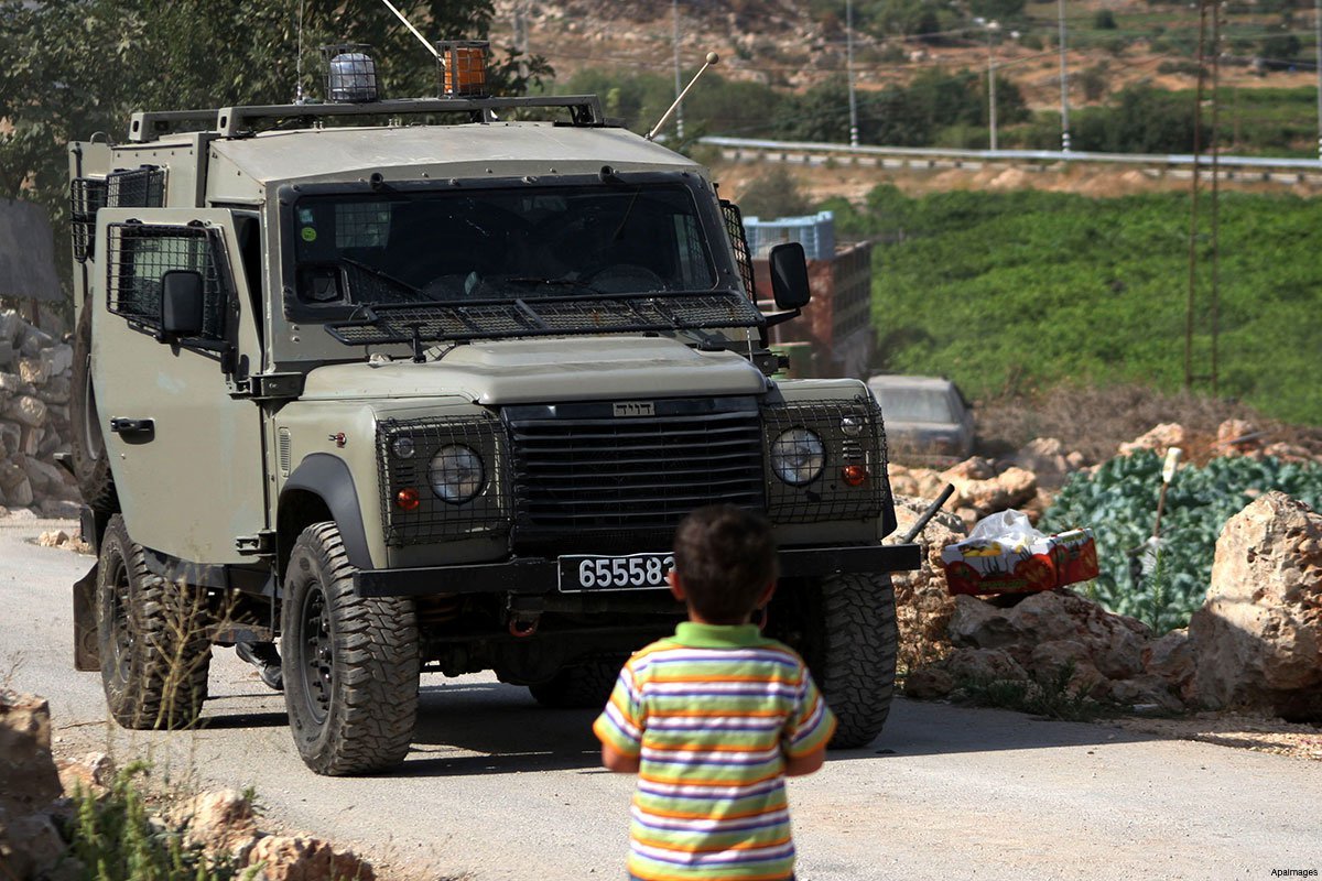 palestinian-child-israeli-military-jeep.jpg