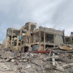 families sheltering in partially destroyed homes